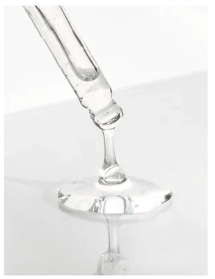 Caffeine Gel Booster 30 ml - klar gel droppar från glaspipett mot vit bakgrund, genomskinlig konsistens