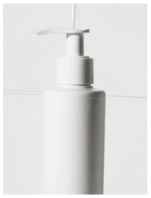 Vit pump-flaska med Clarifying Gel for Men 200 ml mot ljus bakgrund, minimalistisk design med silver pump