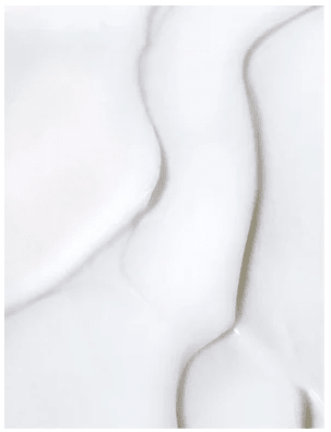 Vit krämtextur av Collagen Anti-Age Night Cream visar den rika, mjuka konsistensen som smälter in i huden