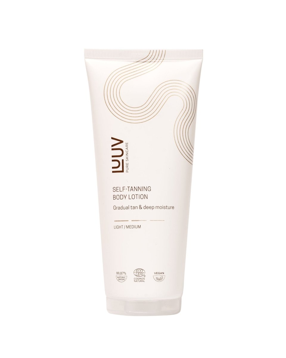 LUUV brun utan sol lotion light/medium – vit tub med guldmönster mot vit bakgrund, 200 ml