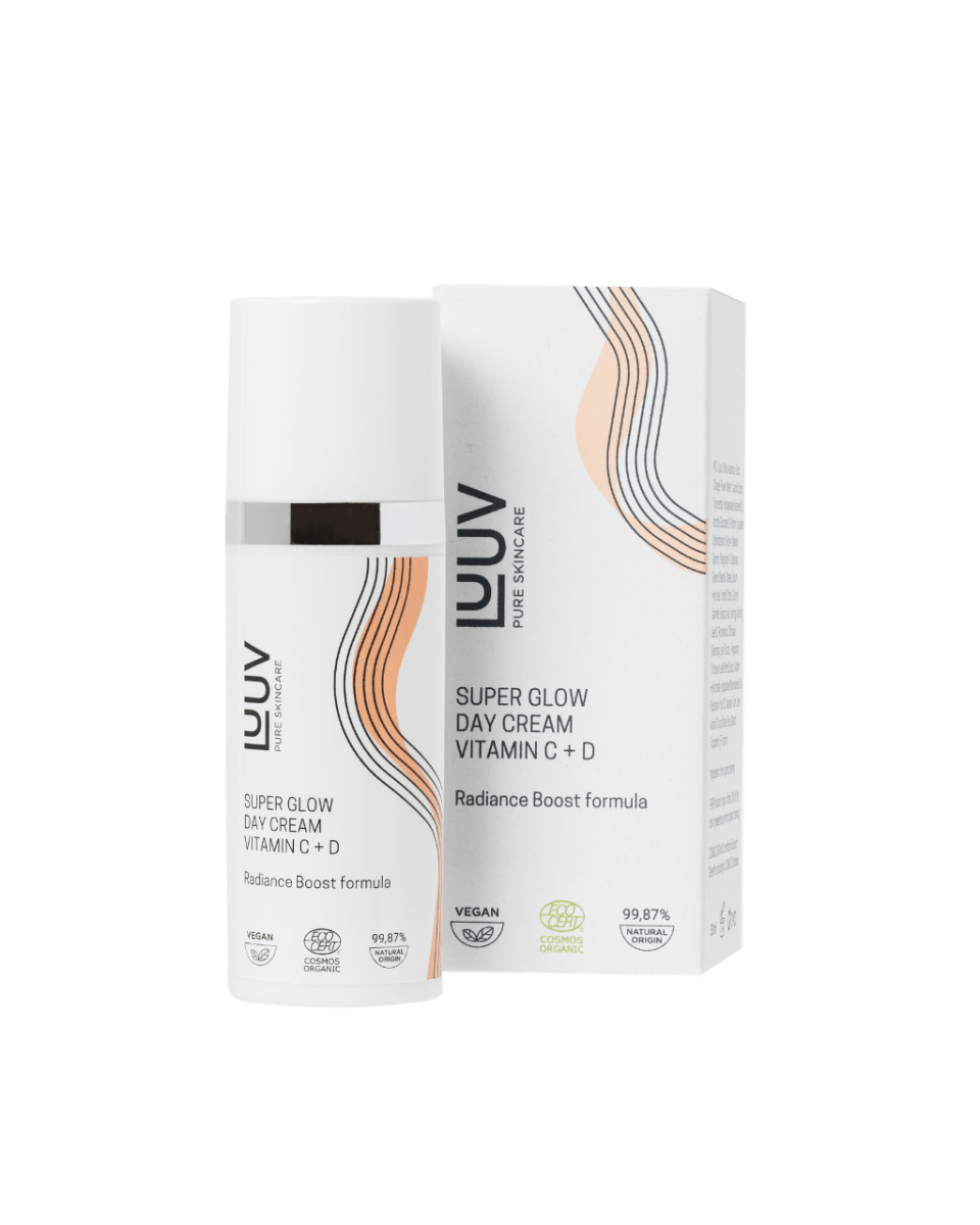 LUUV Super Glow Day Cream i vit tub med orange våglinje-design, visas tillsammans med förpackningen