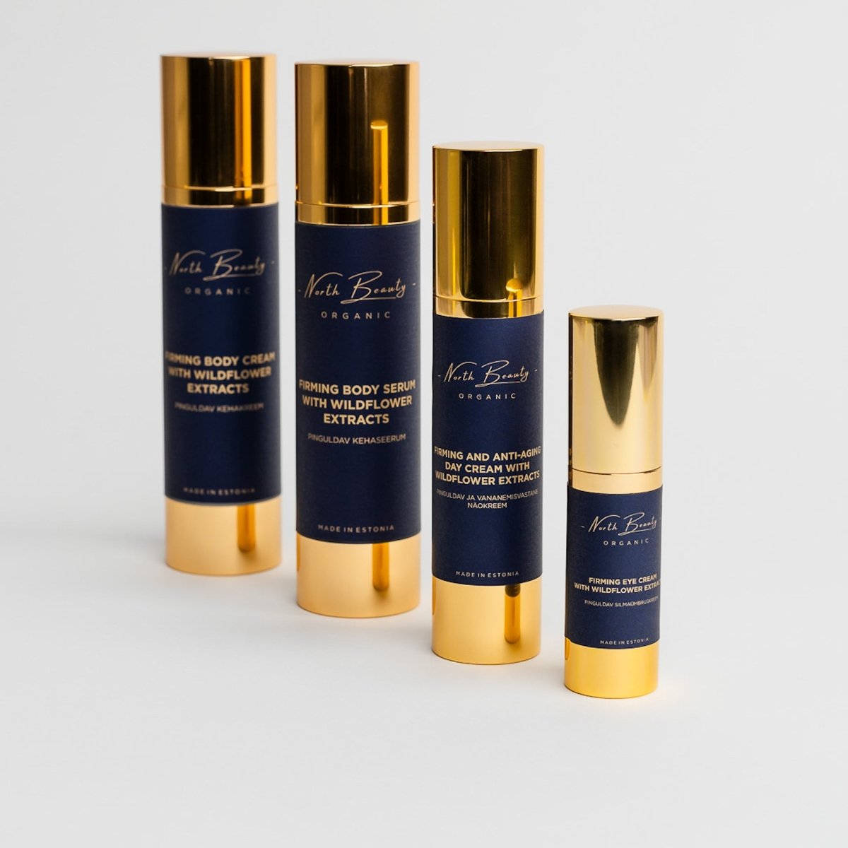 North Beauty åtstramande kit med fyra blå tuber med guldlock - kroppskräm, serum, dagkräm och ögonkräm
