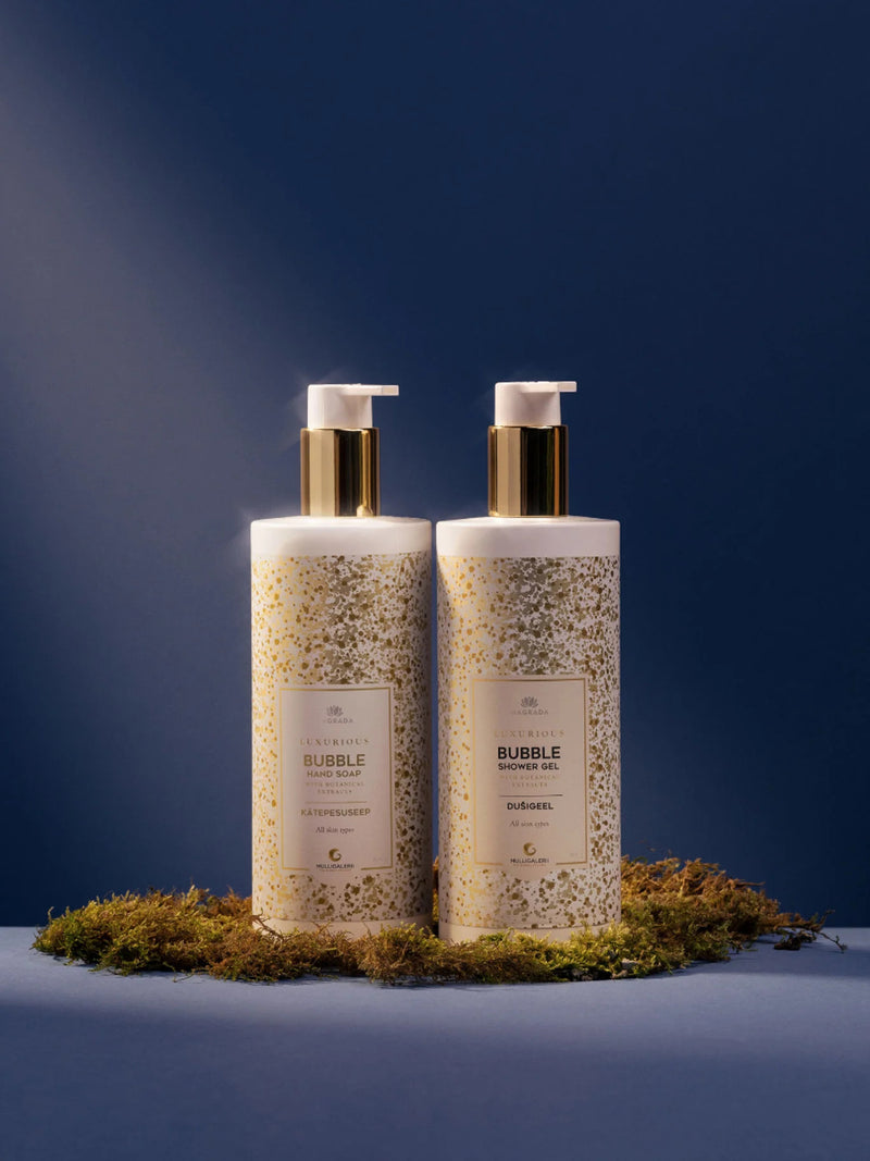 Bubble Shower Gel i vit flaska med guldpump och guldspräckligt mönster, 400ml duschgel från Eclore