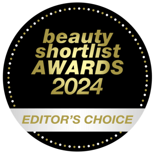 Beauty Shortlist Awards 2024 Editor's Choice utmärkelse - svart och guld rund medalj med vit band