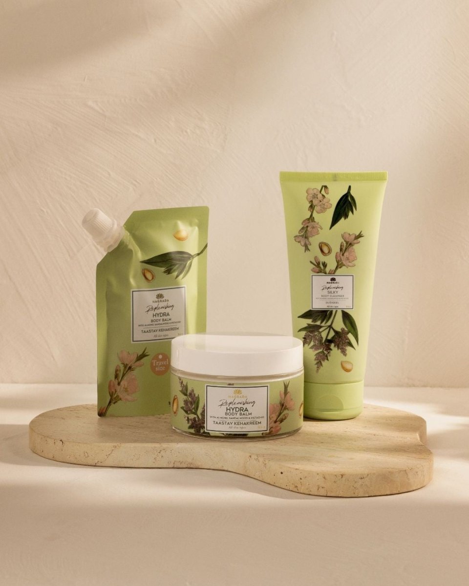 Grön tubförpackning av Magrada X Lauren Moisturizing Shower Gel 200ml med blommiga botaniska motiv på ljus bakgrund