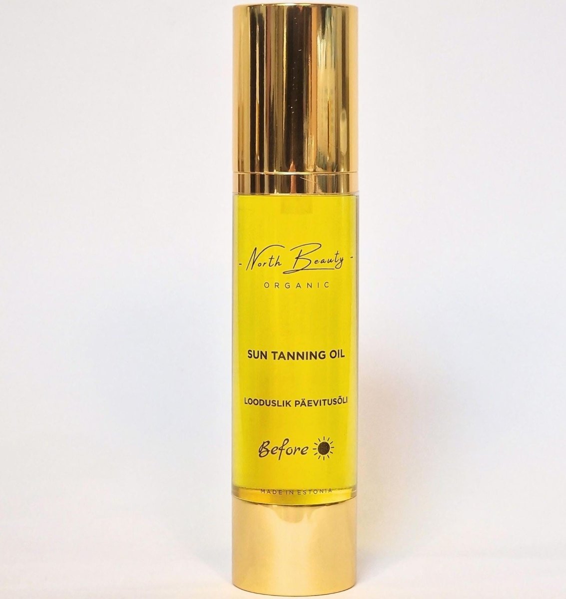 North Beauty Organic Sun Tanning Oil i gul flaska med guldigt lock, 50ml naturlig solbrännolja