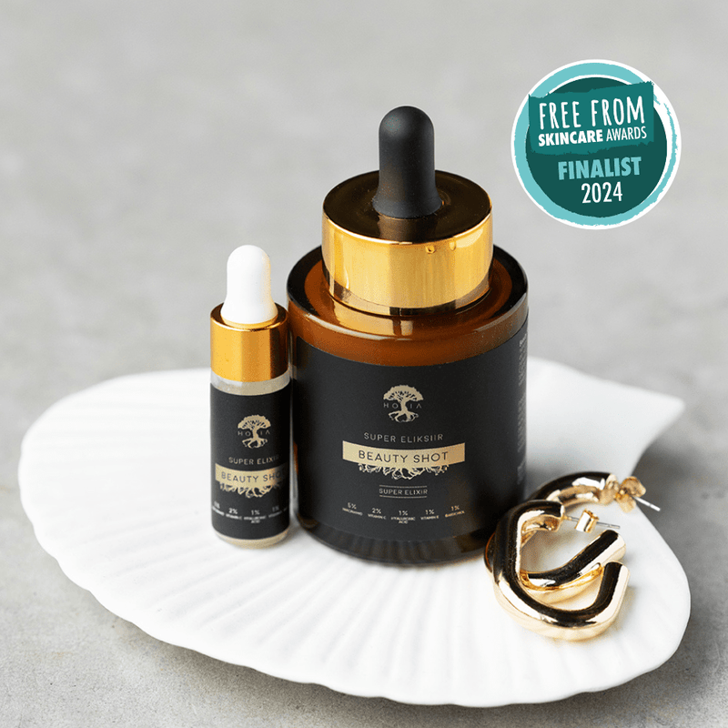 Beauty SHOT Serum i två storlekar med guldpipett, guldringar och Universal Beauty Awards 2024-utmärkelse
