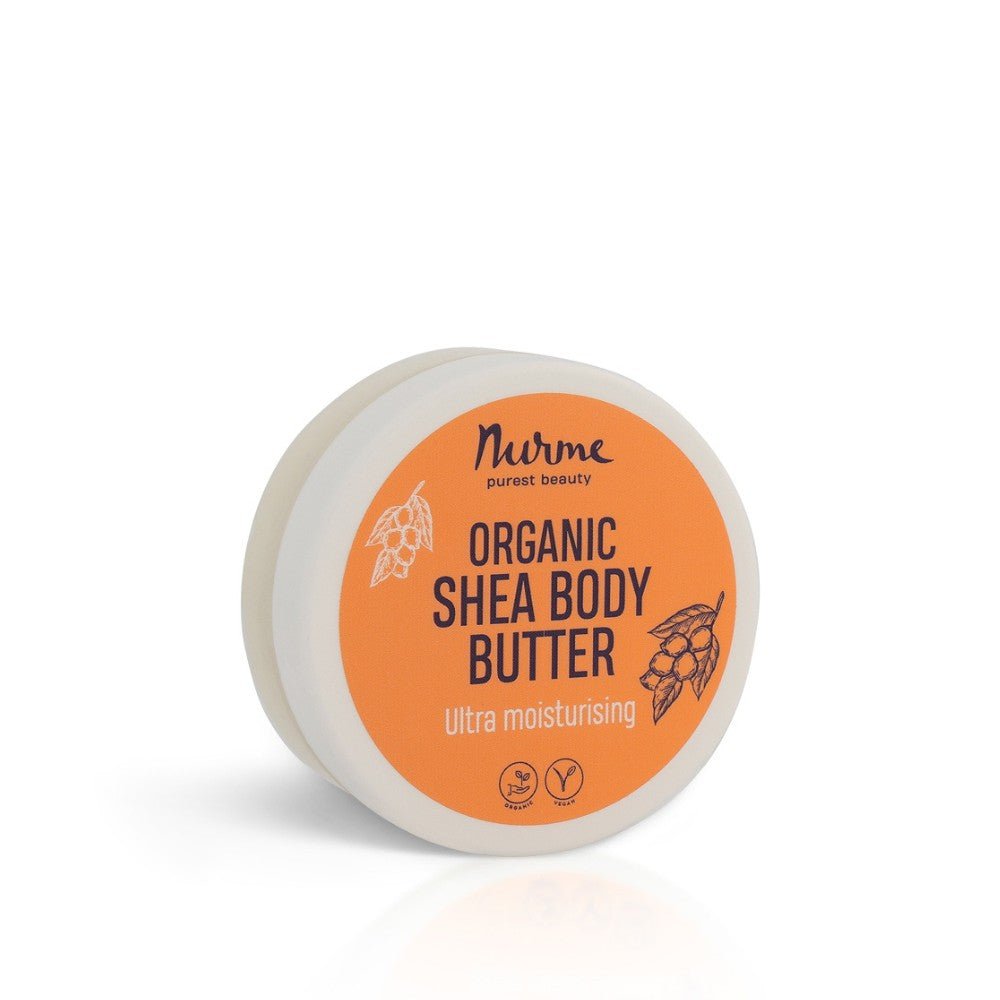 Rund vit burk med orange etikett för Nurme Organic Shea Body Butter 50ml ultra moisturising kroppskräm