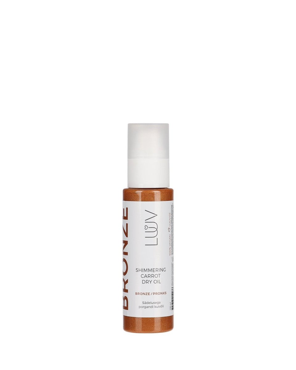 Shimmering Carrot Dry Oil Bronze i genomskinlig sprayflaска med vit pump och bronsfärgad glittrig olja