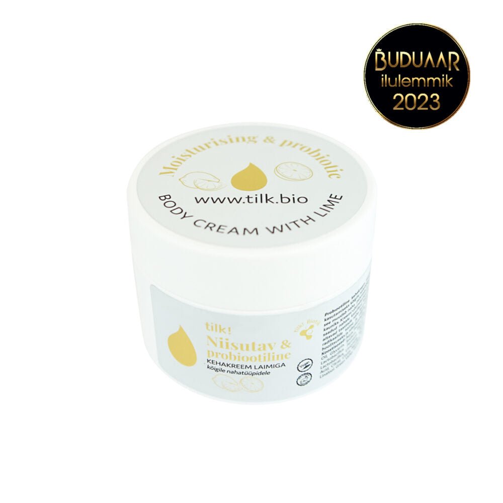 Vit plastburk med Tilk Moisturising Probiotic Body Cream med lime, gul logotyp och BUDUAR-utmärkelse 2023